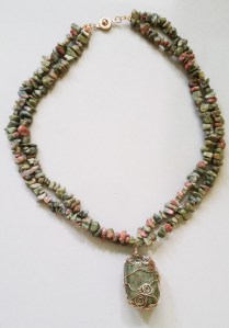 Materials: Unakite tumblestone, Unakite chips, gold wire, snap clasp