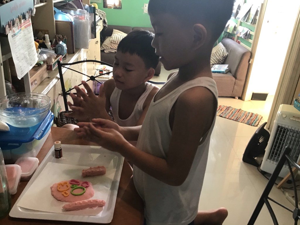 my kids playing with the play dough I just made