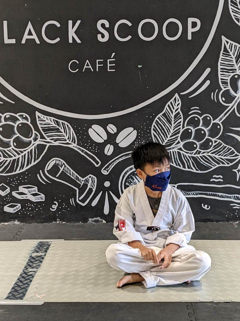 Ian in his taekwondo uniform