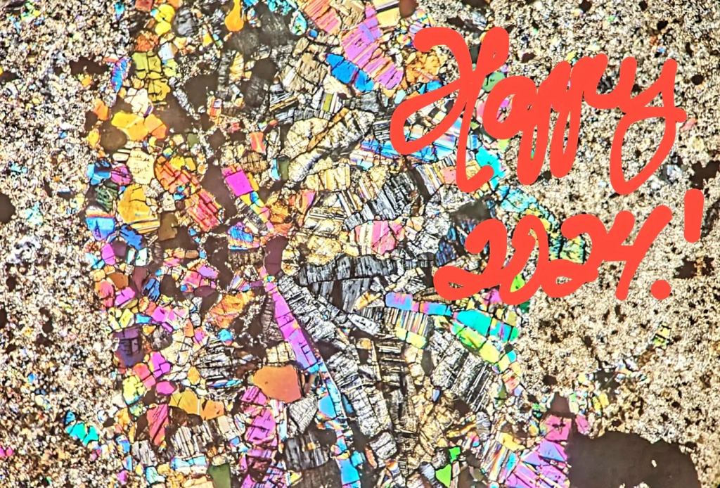 photomicrograph of gypsum and anhydrite with happy new year 