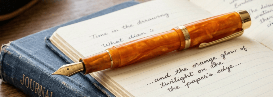 Amber fountain pen on open journal labeled "JOURNAL & OBSERVATIONS," with handwritten reflections and a book and ink bottle nearby